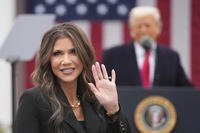Homeland Security Secretary Kristi Noem is recognized as President Donald Trump speaks