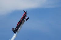 Rob Holland performs flying aerobatics in an MXS-RH
